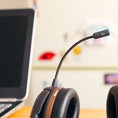Desk with computer and cellphones